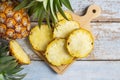 .Fresh pineapple fruit sliced Ã¢â¬â¹Ã¢â¬â¹on a wooden cutting board Royalty Free Stock Photo